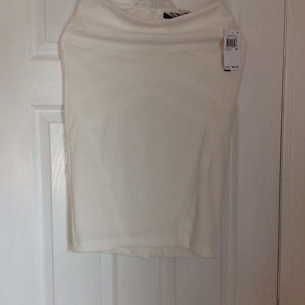women pencil ivory skirt size XS above knee.